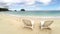 Aerial flight : two Empty chair on a beach by the ocean