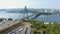 Aerial fly over Northern Bridge Moskovsky in Kiev at summer. View from above