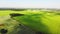 Aerial fly over scenic agricultural farming fields