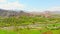 Aerial fly over scenic spring panorama of blooming trees and mountains, countryside in Turkey