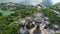 Aerial fly-over view of Gardens By The Bay, Singapore. Featuring Supertree Grove, Cloud Forest and Flower Dome