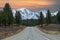 AERIAL Flying above the empty interstate road with a perfect view of the Rockies