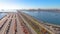 AERIAL: Flying along the busy industrial railway by the Port of Los Angeles.