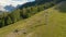 AERIAL: Flying along an empty chairlift not working the summer off-season.