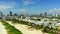 Aerial flying forward Miami Beach into the city 4k 60p