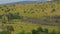 AERIAL Flying high above a massive stampede of countless zebras and wildebeests.