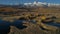 Aerial. Flying over the beautiful lake near mountains. panorama. Autumn.