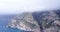 Aerial flying over rocky Amalfi coast.