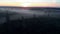 Aerial flying top view: Scary spooky misty morning nature dark landscape - Foggy scenery