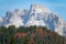 AERIAL: Flying towards a breathtaking rocky ridge in the scenic Dolomites.