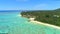 AERIAL: Flying towards a luxurious oceanfront resort in beautiful Cook Islands.