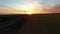 Aerial flyover of field at sunset, Australia Outback