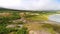 Aerial flythrough of beautiful lake and forest