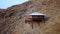 Aerial footage of African wooden lodge in the Namibian desert close to Sesriem.