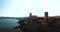 Aerial footage of Antibes, France, Cote D Azur. Beautiful sunny day in Mediterranean Sea. Old castle and sea. Roofs and