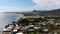 Aerial footage of the beautiful small town known as St George South in the city of Corfu Greece, showing scenic view with