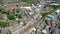 Aerial footage of the British village of Pudsey in Leeds West yorkshire in the UK showing a train track on a viaduct in the