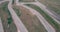 Aerial footage of car racing track with corners championship driving cinematic look asphalt burned tires  cloudy day high speed co