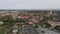 Aerial footage of cars on car park at Stanford University campus. Complex of historic buildings. Stanford, California