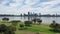 Aerial footage of the city of Perth across water from Sir James Mitchell Park in Australia