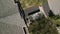 Aerial footage of Dumpster full of garbage from an home