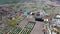 Aerial footage of the Fantasy Island caravan camping resort park in the village of Skegness showing rows of caravans and the