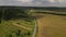 Aerial footage of foliage in small Estonian town. Autumn aerial flyover of scenic town.