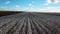 Aerial footage of mechanized cotton harvesting on a farm in São Paulo Brazil