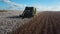 Aerial footage of mechanized cotton harvesting on a farm in São Paulo Brazil