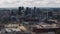 Aerial footage of modern town development at city marina. Yachts and sailboats moored at pier. Modern urban neighborhood