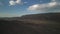 Aerial footage of a mountain range with Las Vegas city in the background