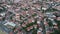 Aerial footage of the old city of Brasov with residential buildings in daylight