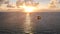 Aerial footage of a passenger and car ferry that goes between Isla Mujeres and Cancun in Mexico at sunrise.