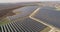 Aerial footage of photovoltaic solar farm. Solar farm power station from above. Ecological renewable energy.