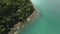 aerial footage of rocky tropical coastline