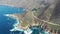 Aerial footage of scenic coastline in California on beautiful day