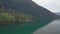 Aerial footage of small pier located in Eidfjorden near Hardanger bridge,Kinsarvik,Norway.