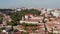 Aerial footage of town buildings variety. Camera flying along Necessidades Palace. Lisbon, capital of Portugal.