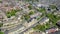 Aerial footage of the village of Morley in Leeds UK, showing an aerial view of the main street and residential houses on a bright