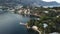 Aerial footage of the Villefranche resort-town surrounded with mountains, buildings and trees