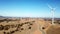 Aerial footage of wind farm on hills