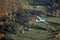 An aerial glider flies over Warren, Vermont in autumn