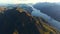 Aerial Glimpse of Norwegian Peaks on Coastal Rocky Islands