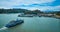 Aerial Golden Gate Ferry heading toward Corinthian Yacht Club on Tiburon coast and distant mountain