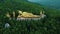 Aerial of Golden Lying/Sleeping Buddha Statue at a Buddhist Temple on Top of Mountain 02