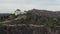 AERIAL: Griffith Observatory with Flight over Hollywood Hills on Cloudy Overcast Day in Los Angeles