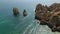 Aerial. Group in kayaks athletes floating in the bay Ponta de Piedade. Lagos.