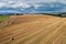 Aerial of hay bales, rolls in an agricultural field