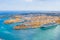 Aerial height view of Malta Valletta and Birgu, floating sailing passanger cruise liner ship to the Great Bay