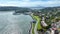 Aerial high up view of Elephant Rock with flight toward Tiburon yachts pier